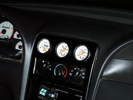 Fiberglassed in gauges in a mustang -- posted image.