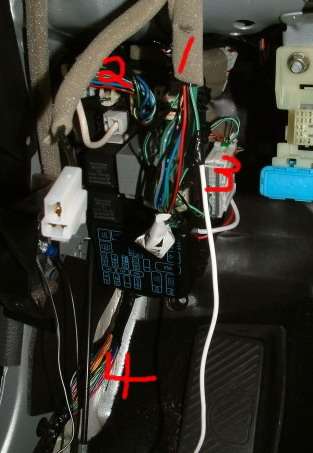 Door lock/unlock wires on 2002 Mirage -- posted image.